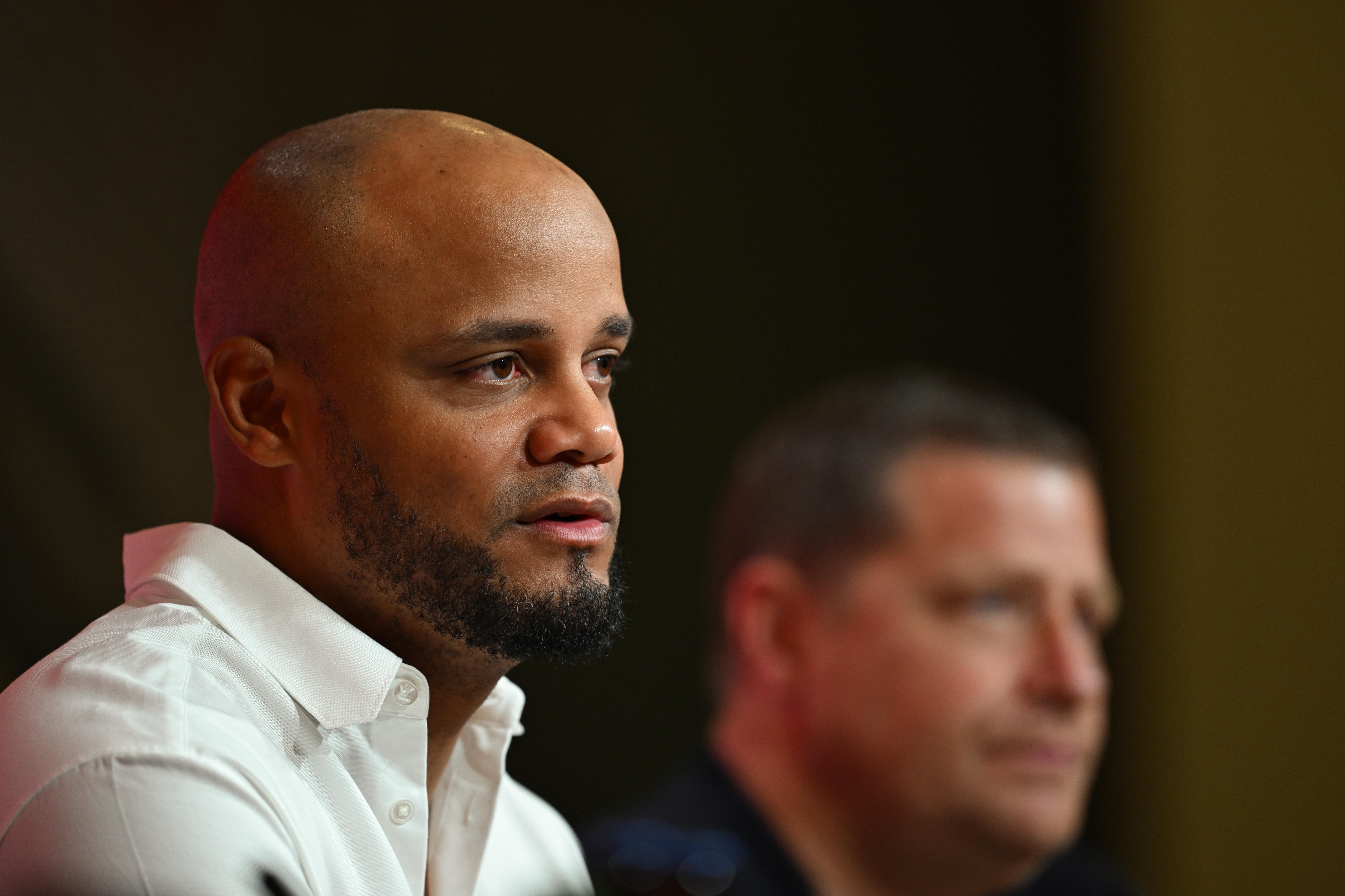 Vincent Kompany (l.) und Max Eberl