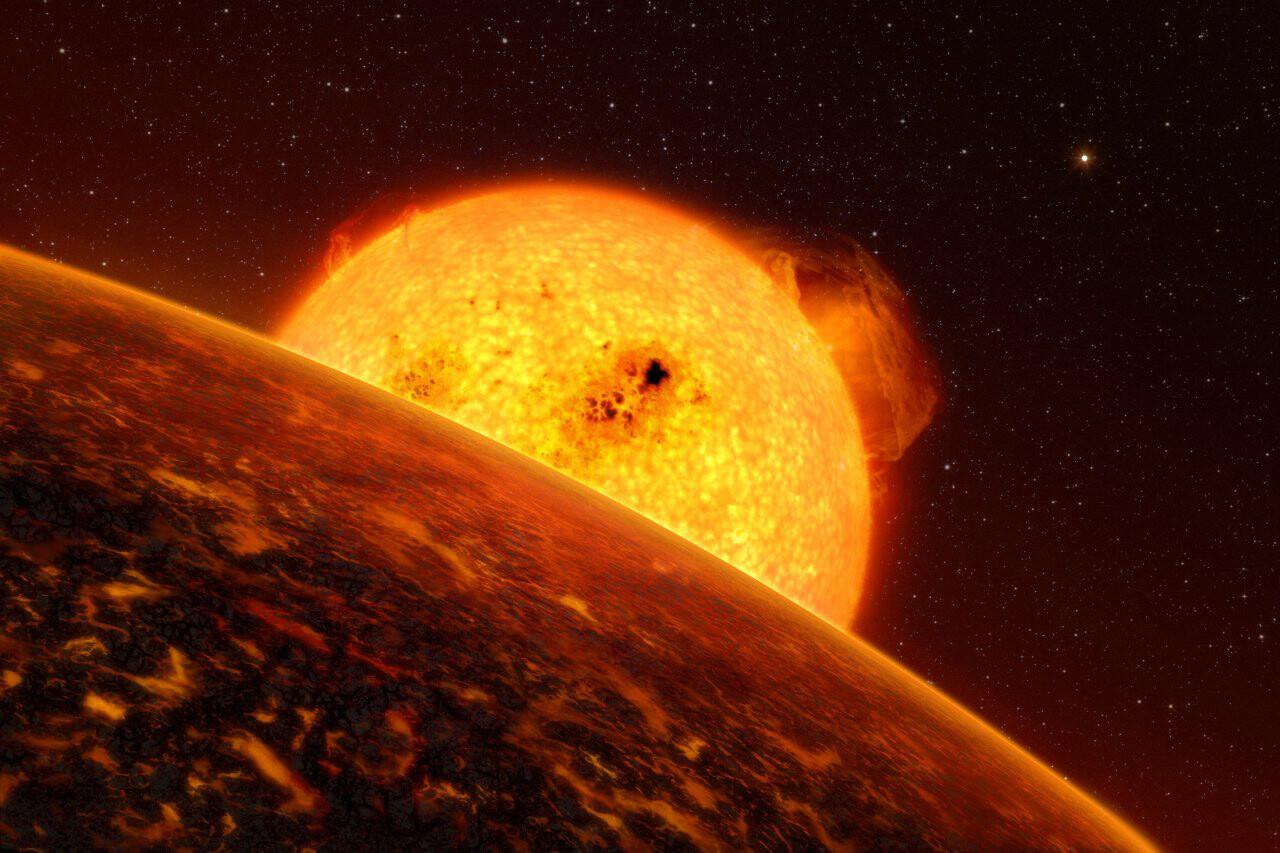 Die künstlerische Darstellung zeigt den Exoplaneten CoRoT-7B vor seiner Sonne.