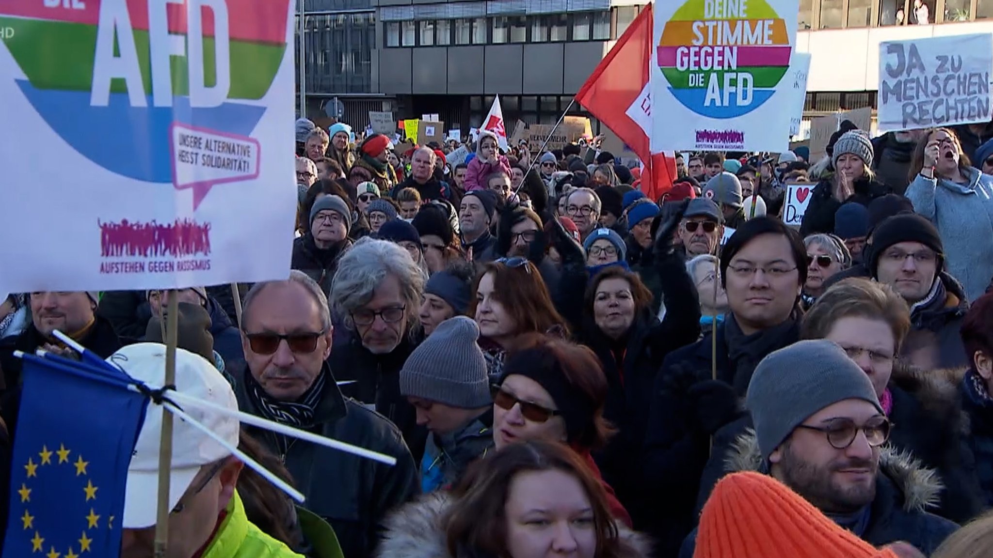 Menschen auf einer Demo.