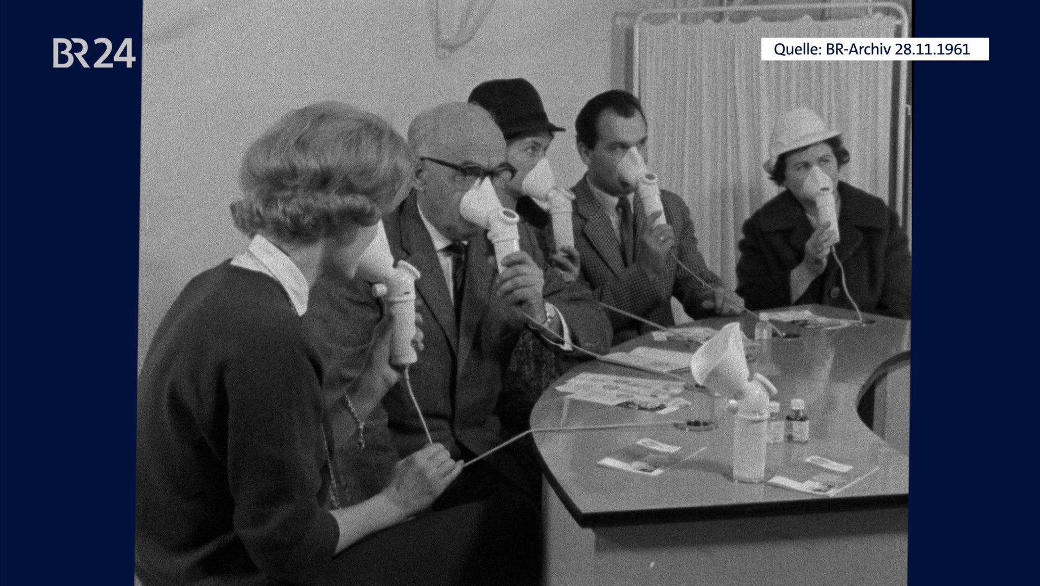 Menschen mit Inhaliergerät an der Warmluftbar