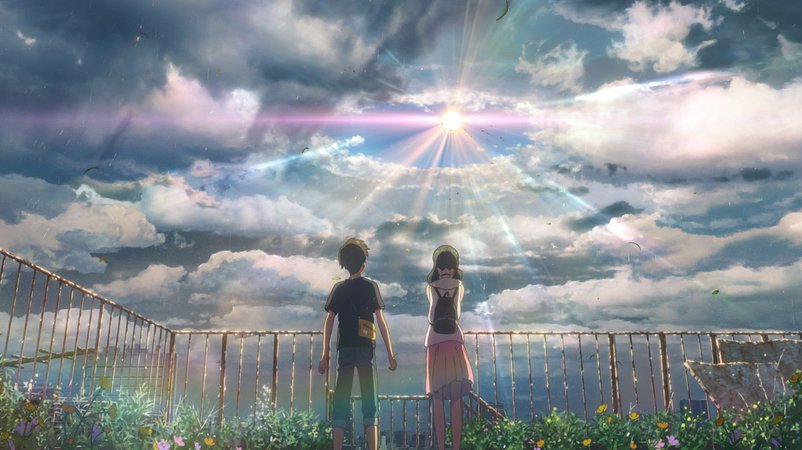 Ein Junge und ein Mädchen blicken in den Himmel: Szene aus dem Anime-Film "Weathering With You"  