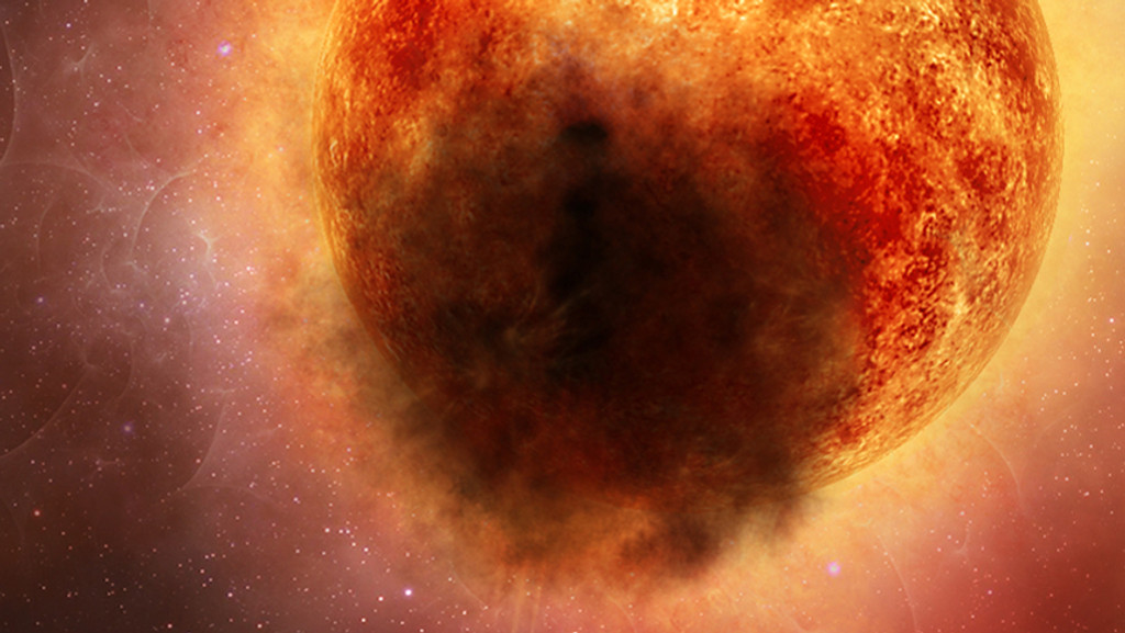 Der Riesenstern Beteigeuze wird eines Tages als Supernova explodieren - aber in dieser Darstellung ist er erst einmal von Staub verdeckt. 