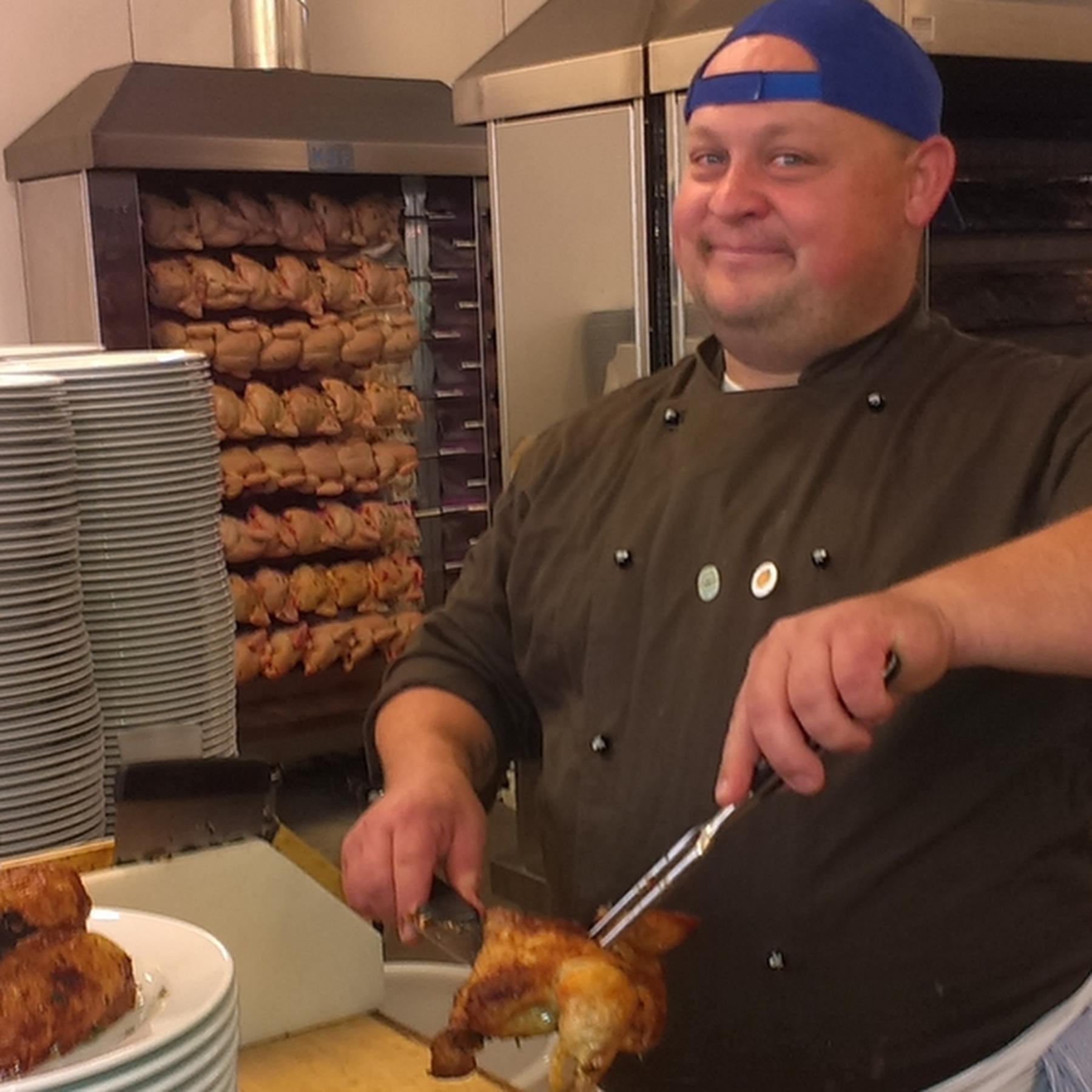 Im Hintergrund der Hendlhacker - Innenansichten des Oktoberfests