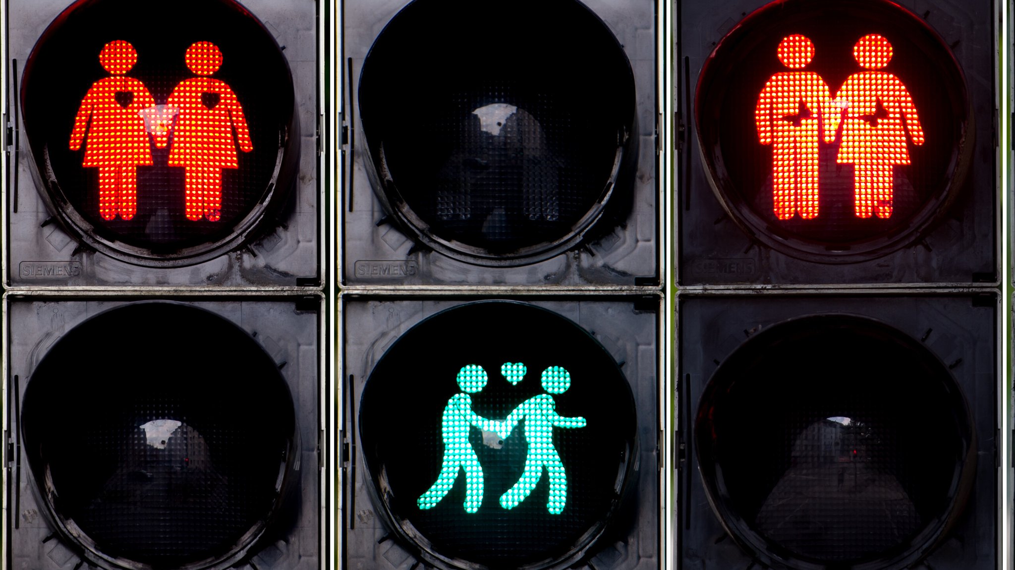 Bildkombi: Seit 2015 sind in München schwule Ampelmänner- und -frauen unterwegs