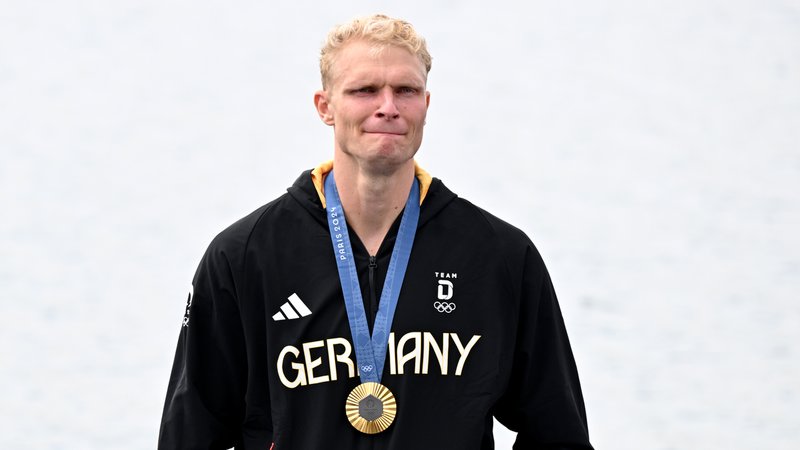 Oliver Zeidler bei der Siegerehrung | Bild: picture-alliance/dpa Oliver Zeidler bei der Siegerehrung