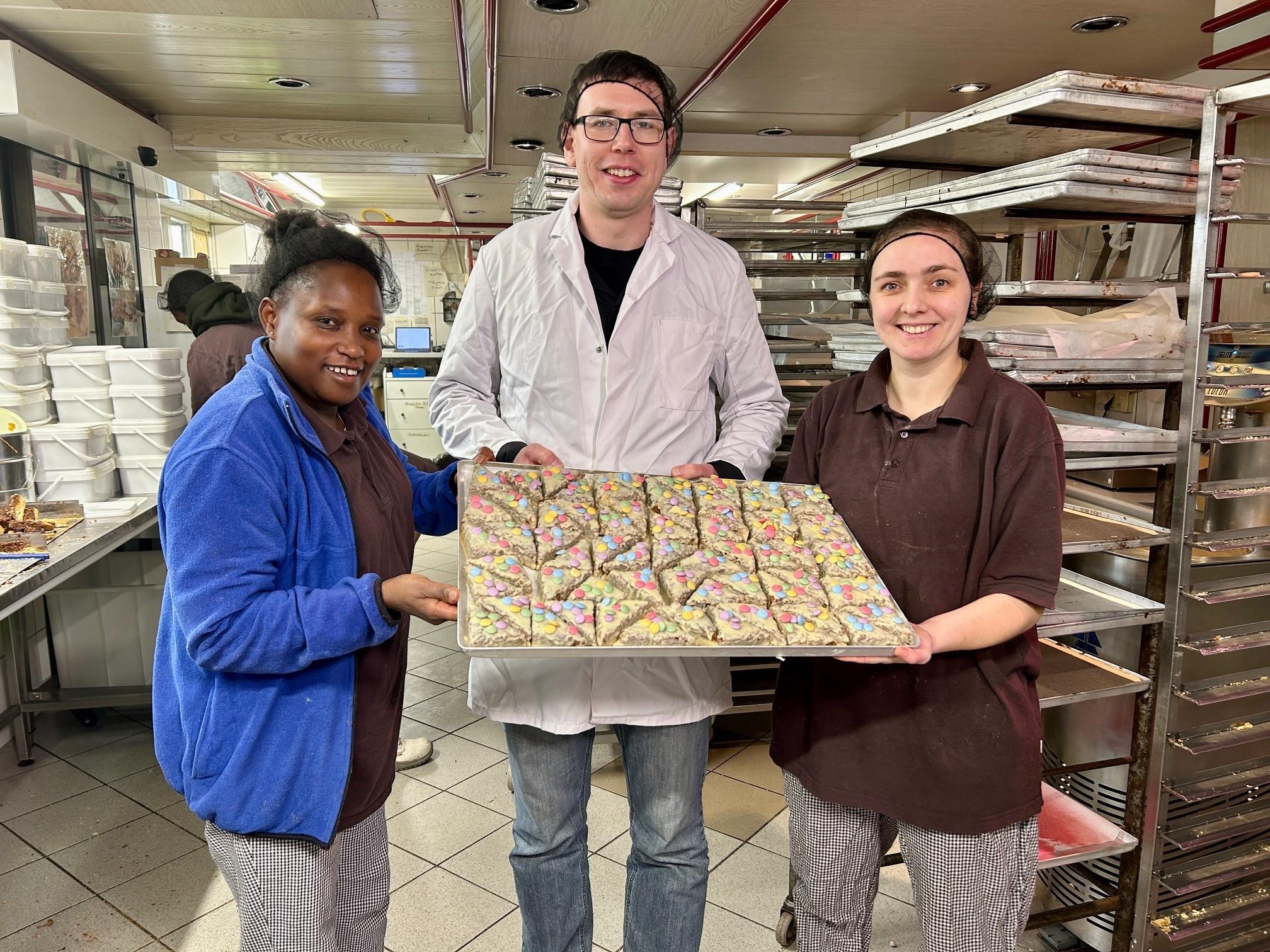 Kai Hübner mit seinen Mitarbeiterinnen