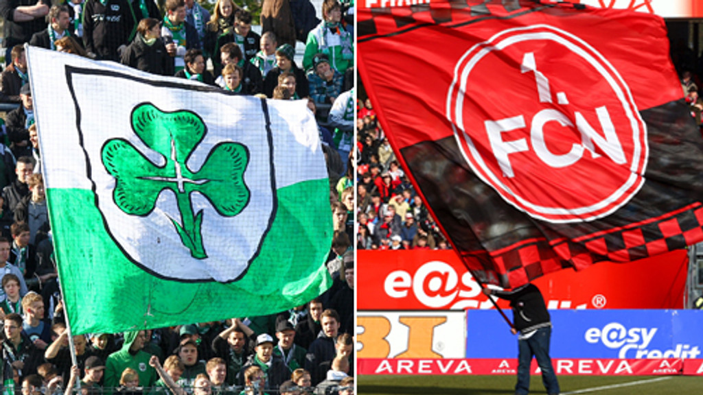 Fans mit Fahnen von Nürnberg und Fürth | Bild: picture-alliance/dpa Fans mit Fahnen von Nürnberg und Fürth