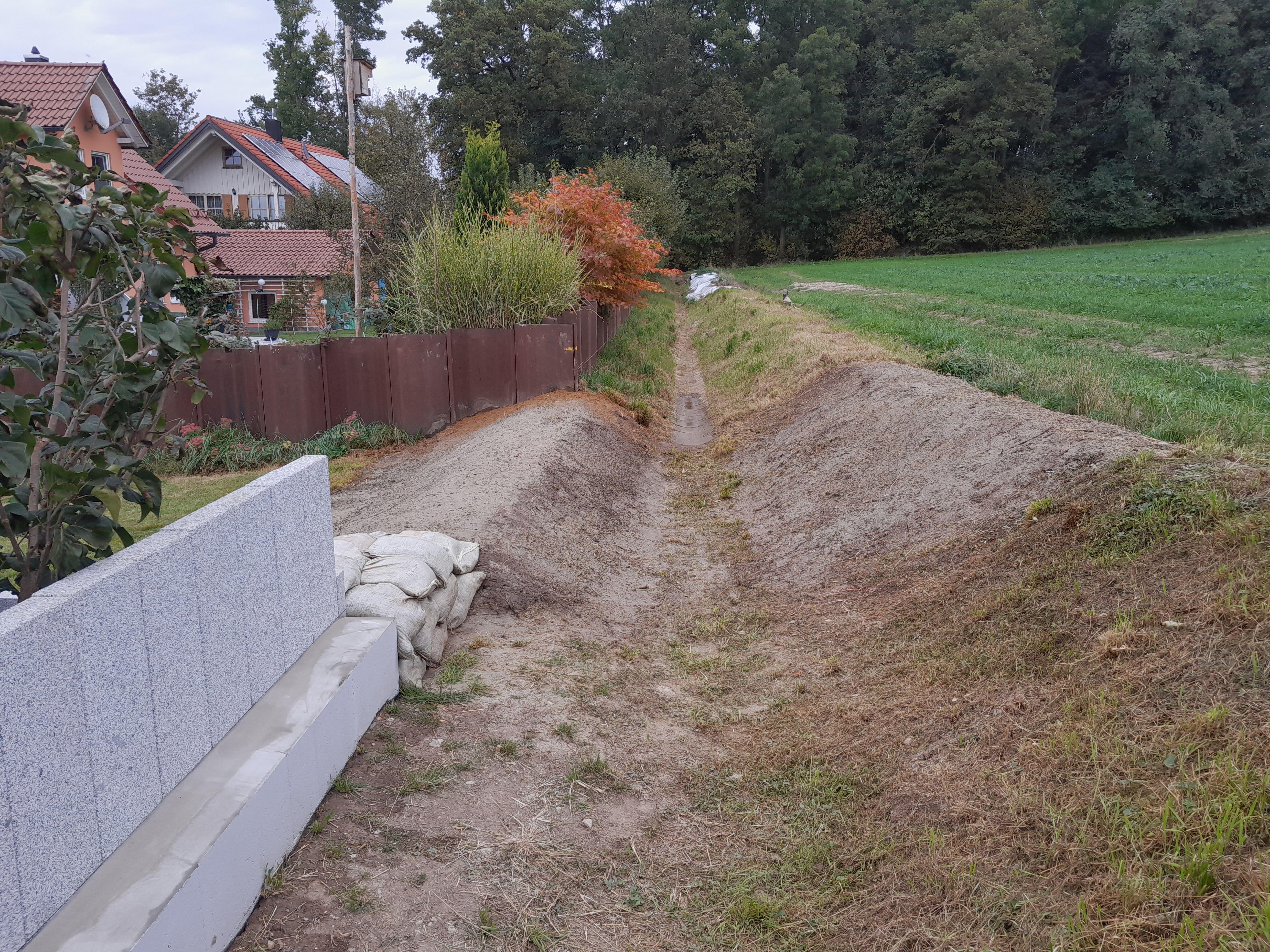Die Mauer muss nicht weg - vorerst kann sich Familie Kögel selbst gegen Hochwasser schützen