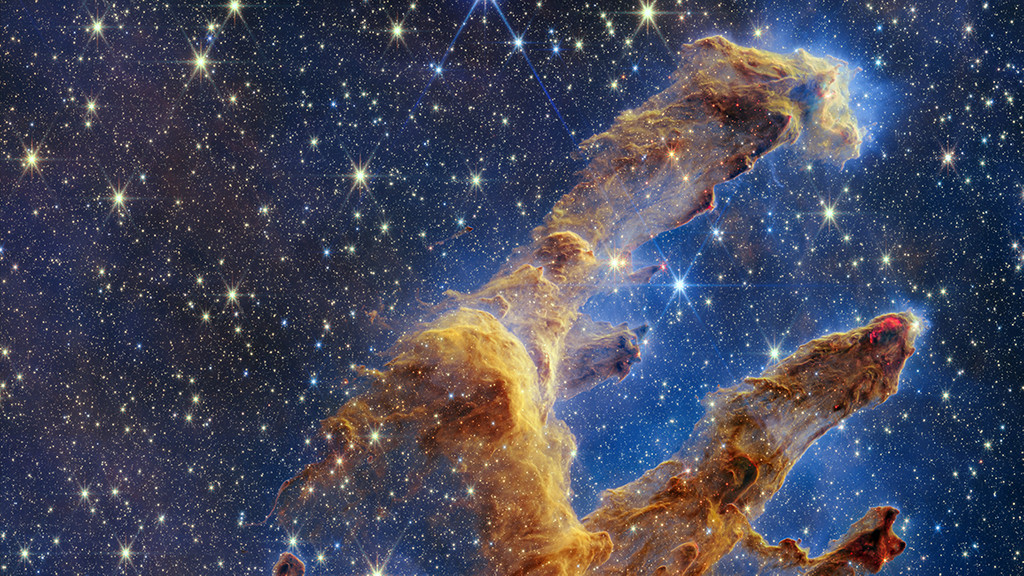 Vor einem Sternenhimmel zeichnen sich bräunlich-gelbliche, wolkenförmige Gebilde ab. Sie scheinen wie Finger von unten nach oben zu deuten. 