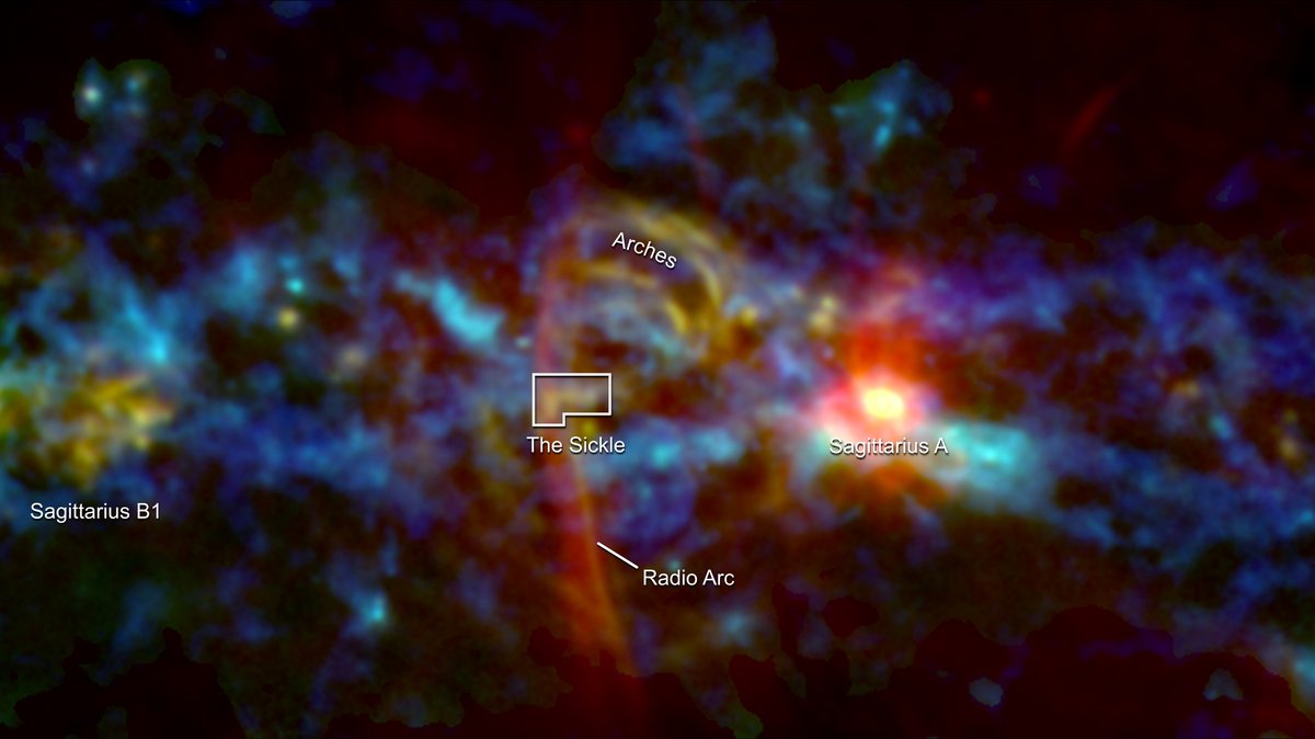Bild vom Zentrum der Milchstraße mit Struktur, die einem Spazierstock ähnelt.