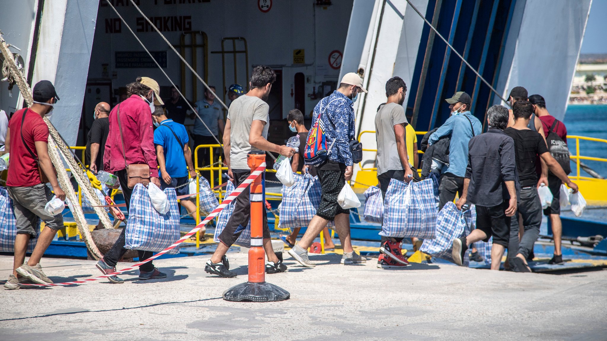 ARCHIV (04.08.2022): Migranten auf Lampedusa (Symbolbild)