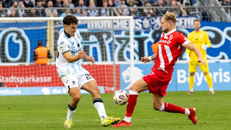Marvin Rittmueller #29 (TSV 1860 Muenchen) im Zweikampf, TSV 1860 Muenchen vs. Energie Cottbus | Bild: picture alliance / kolbert-press | kolbert-press/Ulrich Gamel Marvin Rittmueller #29 (TSV 1860 Muenchen) im Zweikampf, TSV 1860 Muenchen vs. Energie Cottbus