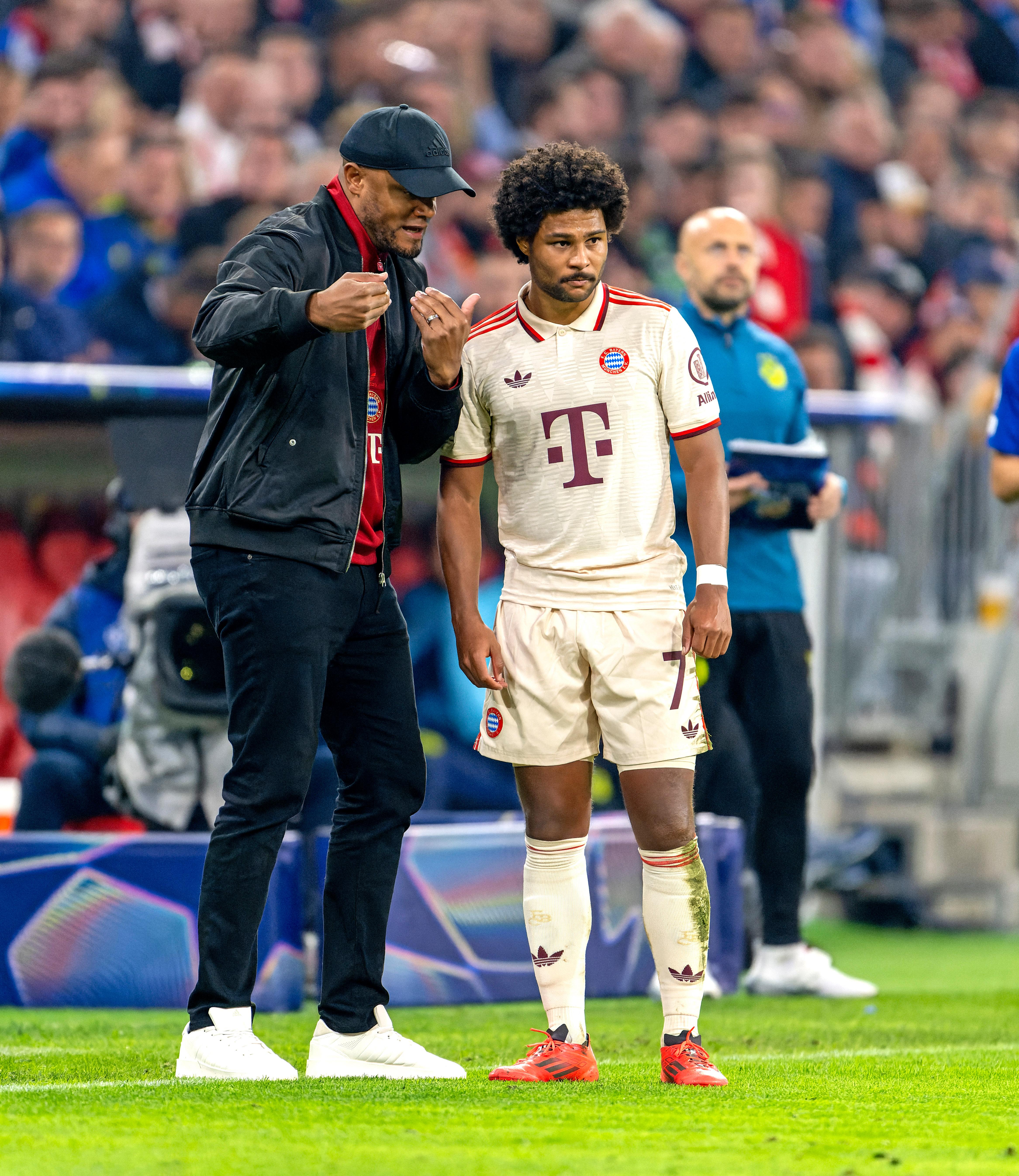 Vincent Kompany (l.) und Serge Gnabry