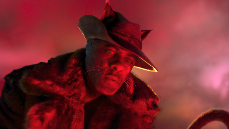 Idris Elba als Kater im Mantel ("Cats"-Filmszene)