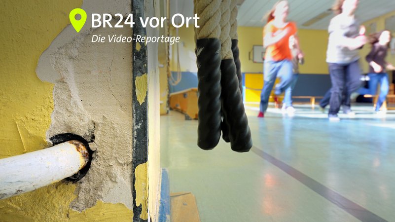 Kinder machen in einer maroden Schulturnhalle Sport. (Symbolbild) | Bild: picture-alliance/ dpa | Uwe Anspach Kinder machen in einer maroden Schulturnhalle Sport. (Symbolbild)