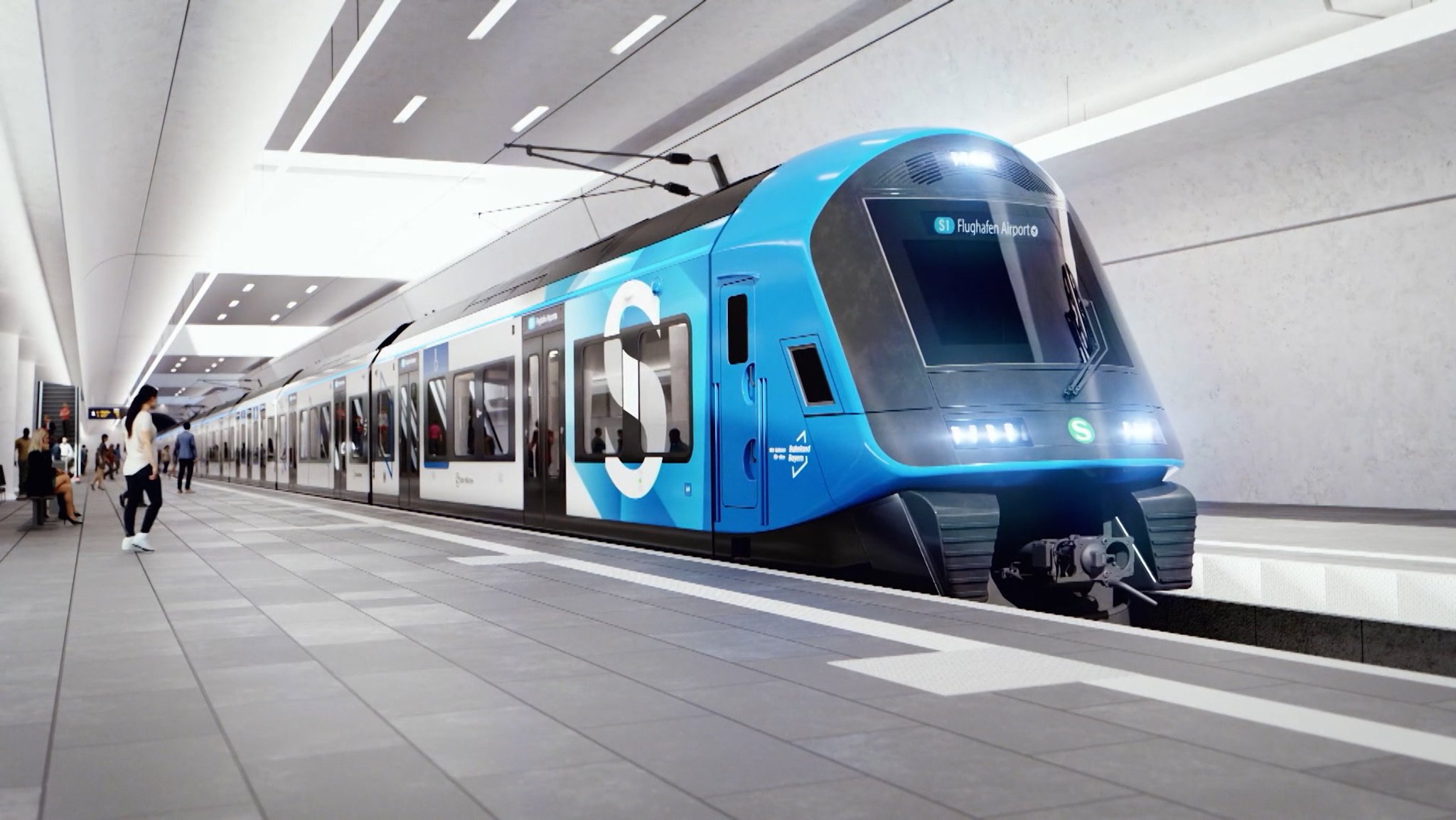 Die neue S-Bahn für den Münchner Nahverkehr steht neben einem unterirdischen Bahnsteig.