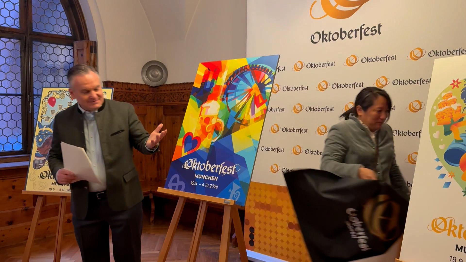 Es zeigt typische Elemente wie Maßkrug, Riesenrad und auch die Frauenkirche.