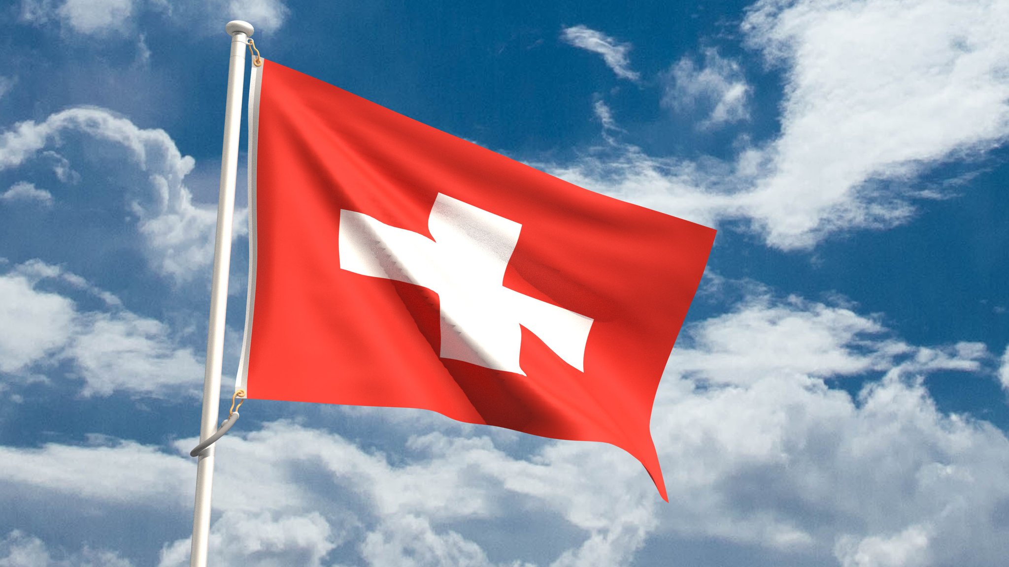 Die Flagge der Schweiz vor bewölktem Himmel. | Bild: stock.adobe.com/StreetOnCamara Die Flagge der Schweiz vor bewölktem Himmel.