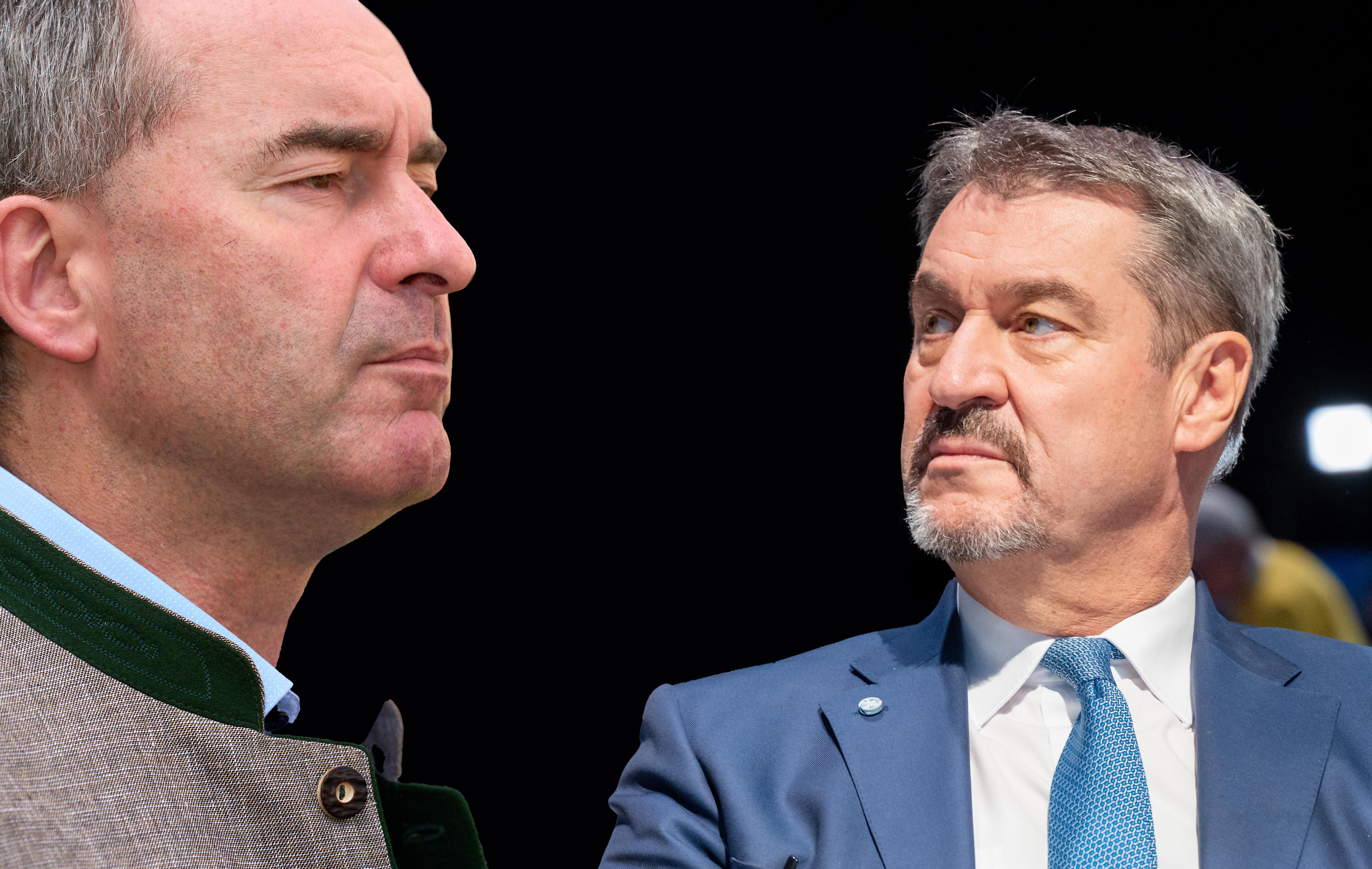 FOTOMONTAGE, Markus Söder (CSU) und Hubert Aiwanger (Freie Wähler) stehen sich gegenüber