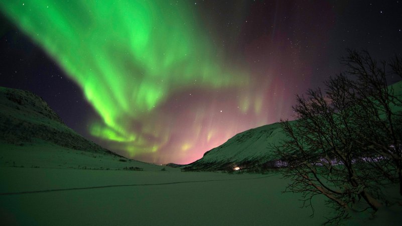 Polarlichter, aufgenommen in der Nähe von Tromsö, Norwegen. Polarlichter sind Gradmesser für das Weltraumwetter.