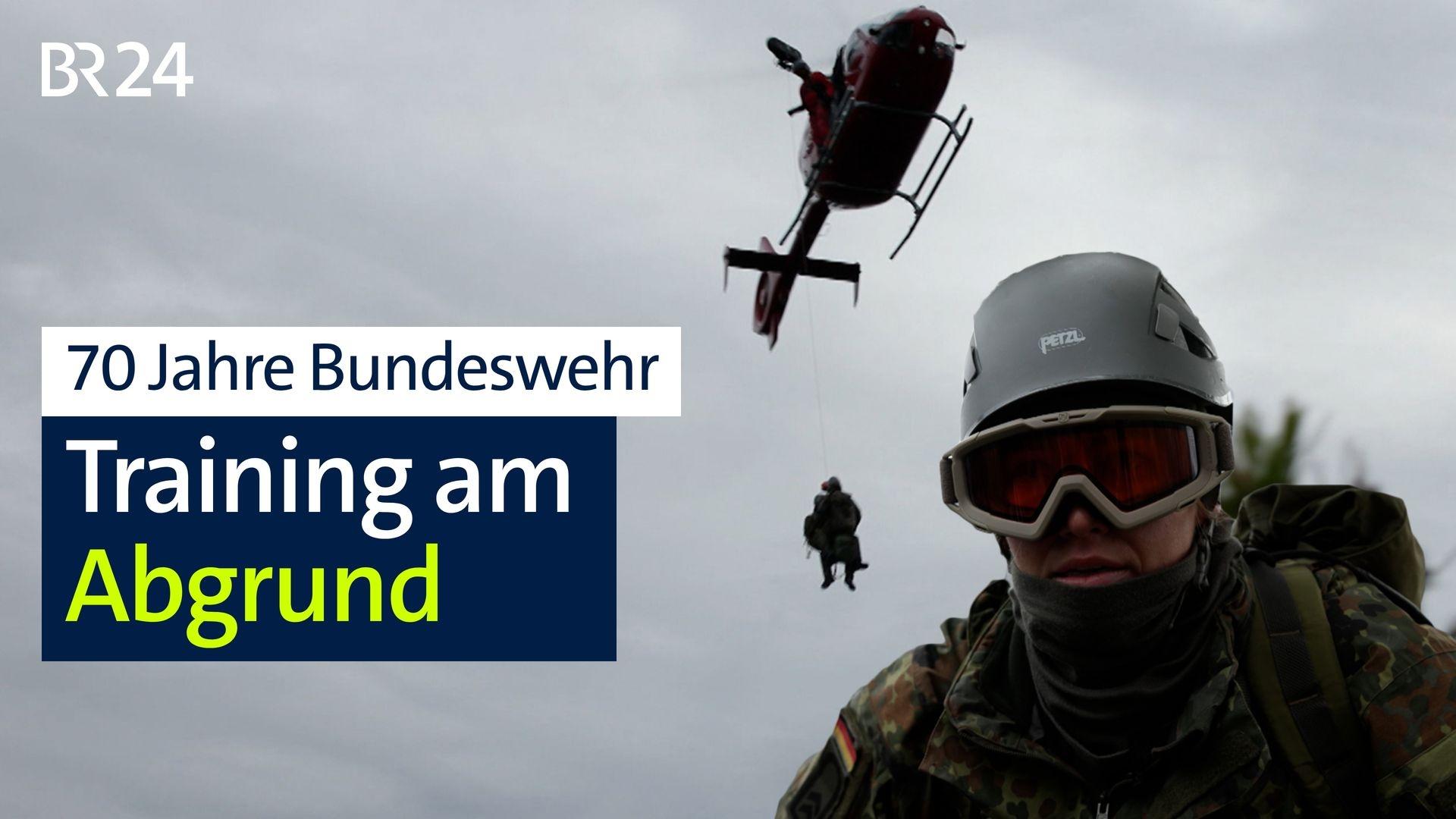 Zu sehen ist ein Helikopter, im Vordergrund Sophie mit Helm und Skibrille.