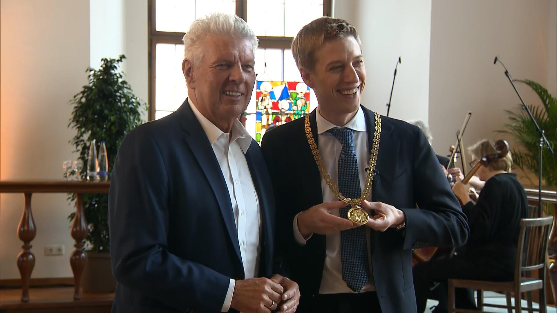 Alt-Oberbürgermeister Dieter Reiter (SPD) und Nachfolger Dominik Krause (Grüne)