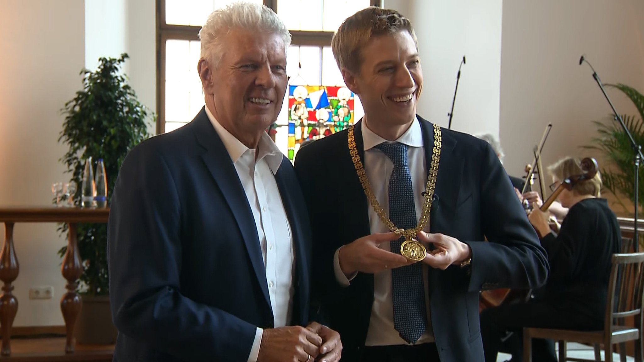 Alt-Oberbürgermeister Dieter Reiter (SPD) und Nachfolger Dominik Krause (Grüne)