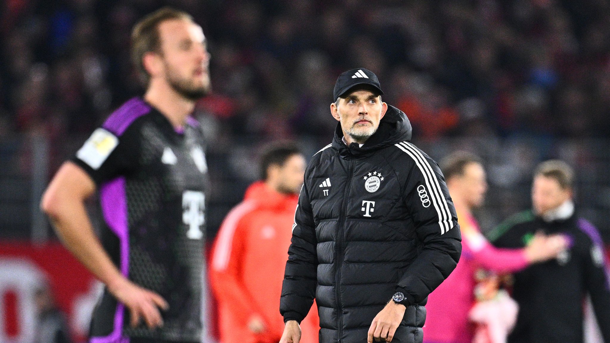 Harry Kane und Thomas Tuchel nach dem 2:2 des FC Bayern in Freiburg