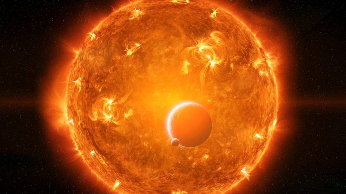 Erde und Mond vor riesiger Sonne; Astronomen haben zum ersten Mal beobachtet, wie ein Stern einen Planeten verschlingt. 