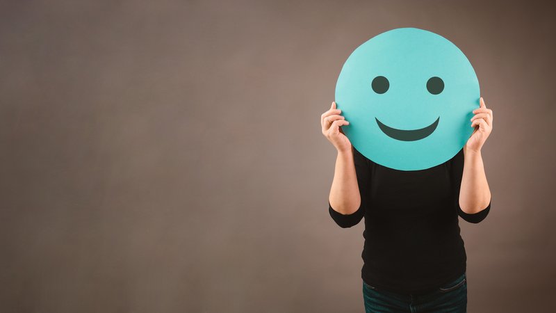 Head with a happy smiling face, mental health concept, positive thinking mind, support and evaluation 