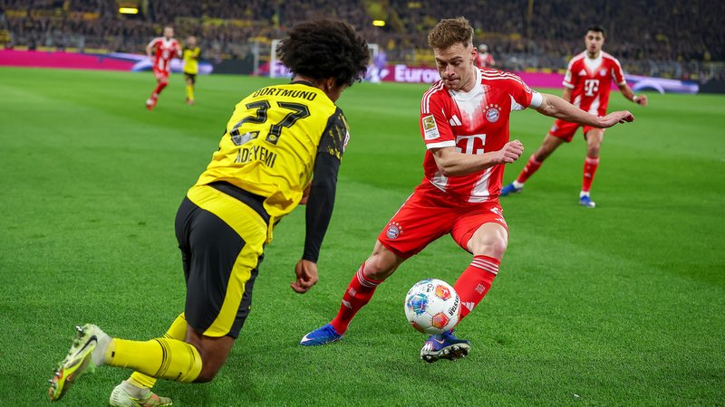 Karim Adeyemi (BVB) im Zweikampf gegen Joshua Kimmich (FCB) | Bild: picture alliance / Maximilian Koch Karim Adeyemi (BVB) im Zweikampf gegen Joshua Kimmich (FCB)