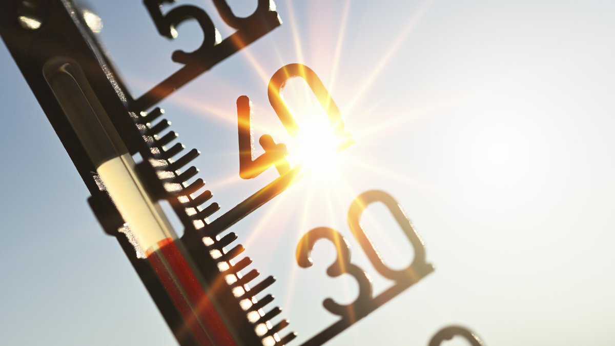 Thermometer mit Sonnenstrahlen
