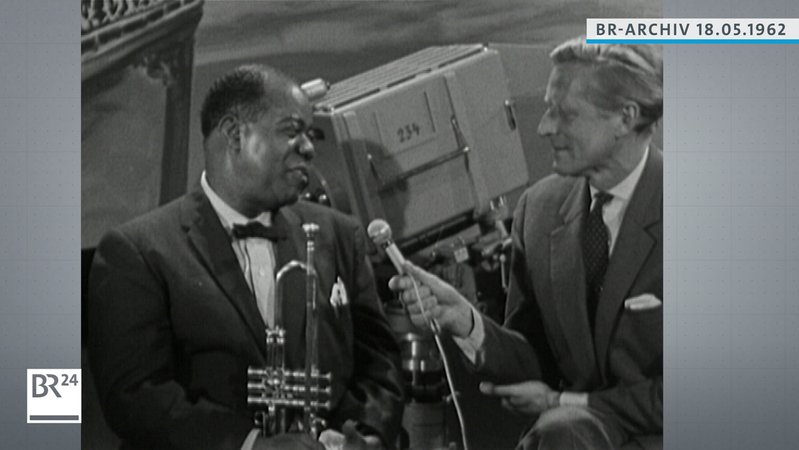 Louis Armstrong und BR-Reporter Wolf Mittler im Gespräch