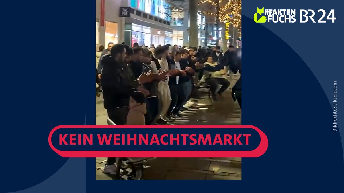 Screenshot eines Videos, das eine tanzende Menschengruppe zeigt, darüber der Stempel "Kein Weihnachtsmarkt".