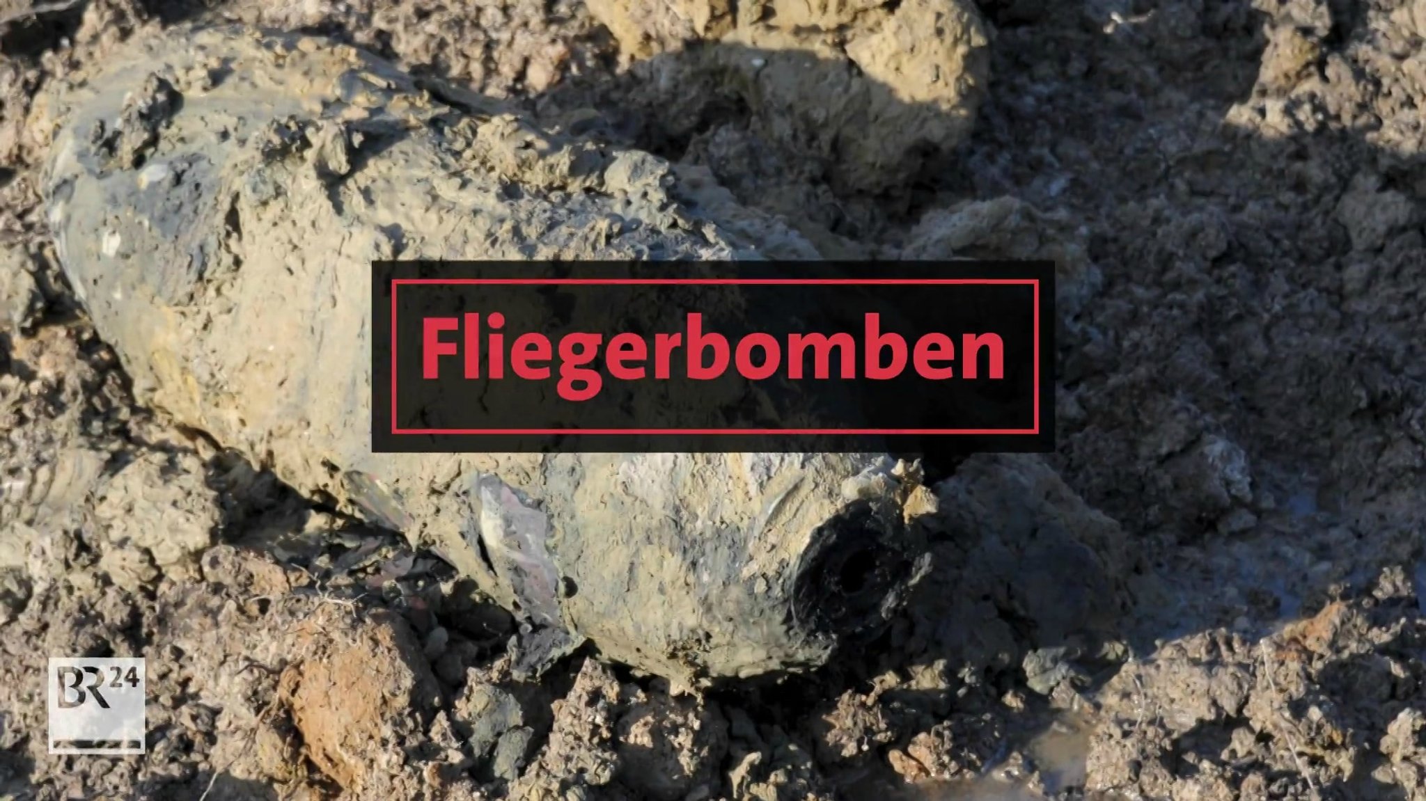 Ein Video erklärt, wie nicht explodierte Bomben entschärft werden können.