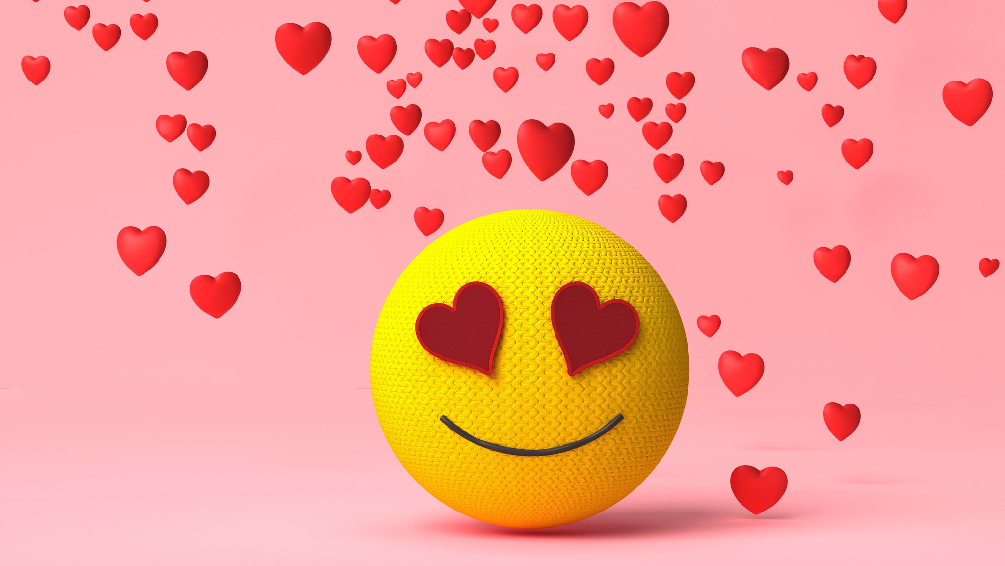 Emoji mit Herzaugen versprüht Herzen.