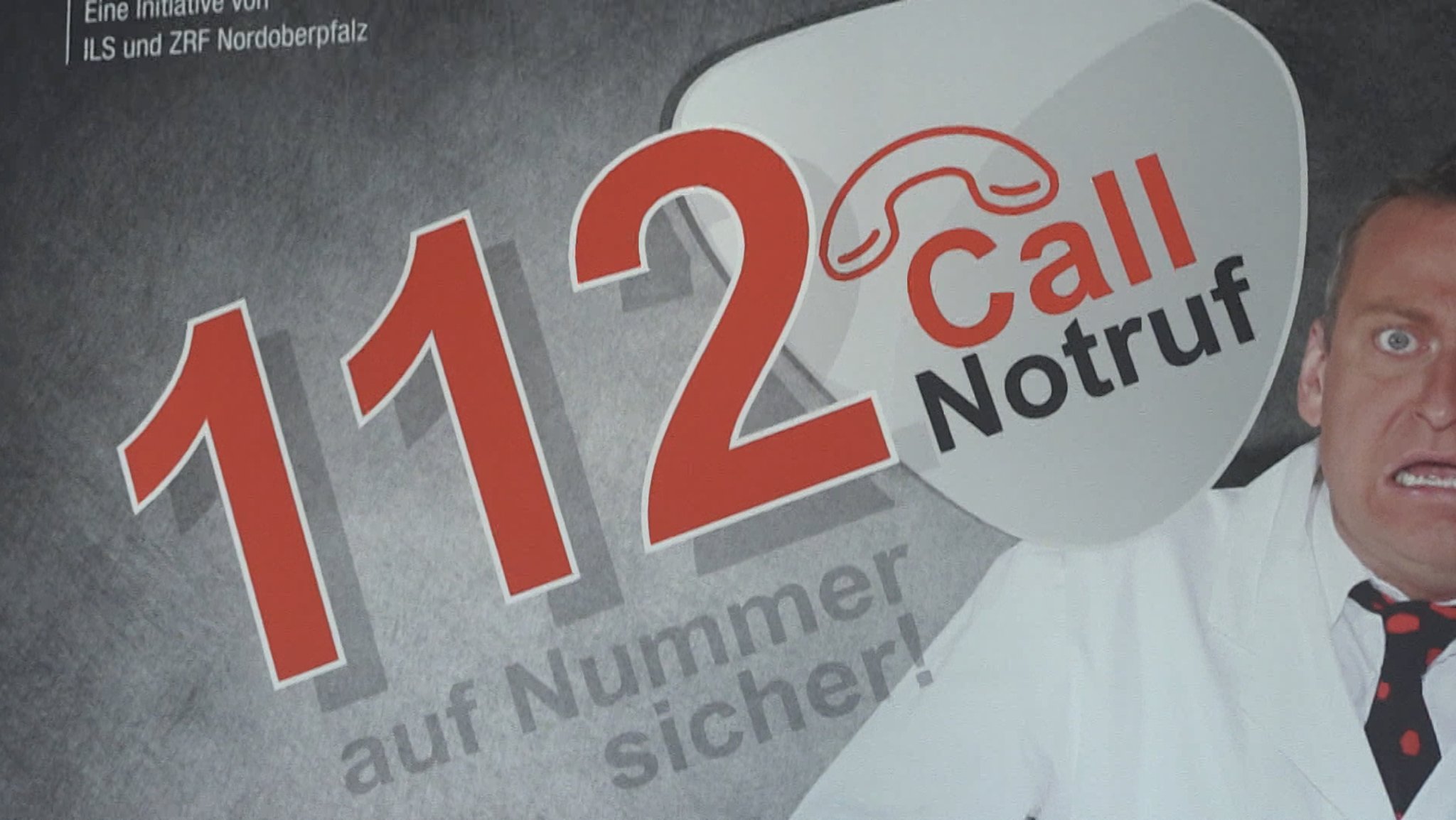 Notruf-Informationsplakat mit der 112 Notrufnummer