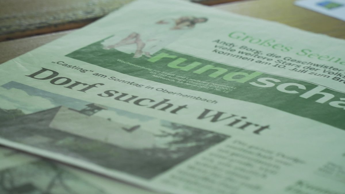 Zeitungsausschnitt mit Schlagzeile "Dorf sucht Wirt"
