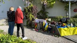 Gedenken in Murnau an ukrainische Soldaten | Bild: REUTERS/Christine Uyanik