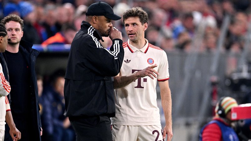 Thomas Müller und Vincent Kompany | Bild: picture-alliance/dpa Thomas Müller und Vincent Kompany