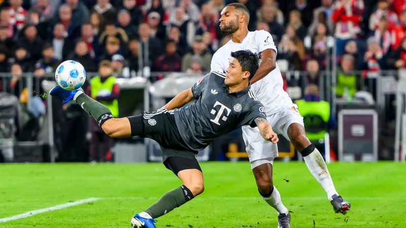 Minjae Kim (FC Bayern) und Jonathan Tah (Bayer Leverkusen) im Zweikampf. | Bild: picture alliance / nordphoto GmbH | Straubmeier Minjae Kim (FC Bayern) und Jonathan Tah (Bayer Leverkusen) im Zweikampf.