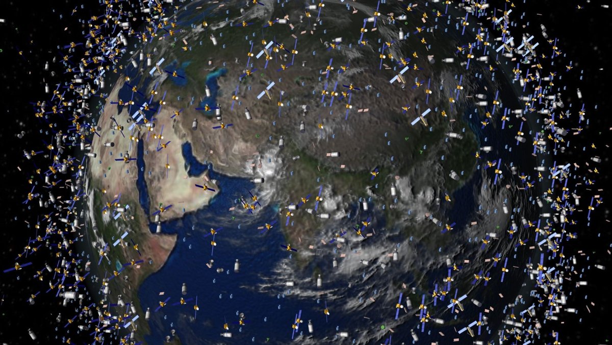 Das computergenerierte Bild der European Space Agency (ESA) zeigt Weltraummüll früherer Weltraummissionen, der neben intakten Satelliten um die Erde kreist (Foto undatiert). (zu dpa: «Zunehmender Weltraumschrott gefährdet 