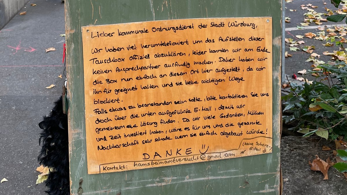 Schild an der Tauschbox in der Würzburger Sanderau