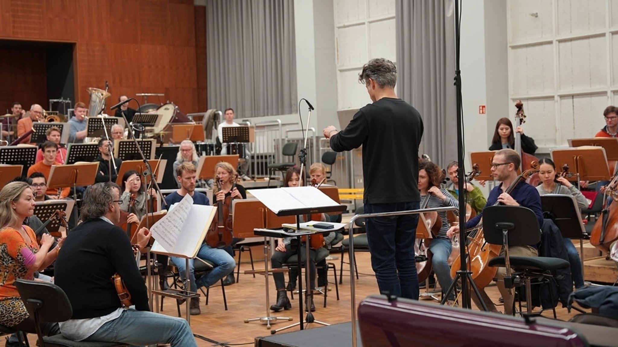 Probe der Münchner Symphoniker mit ihrem Dirigenten Joseph Bastian