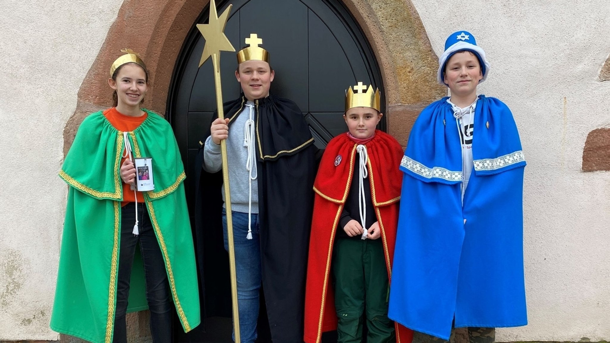 Vier Sternsinger in Unterfranken