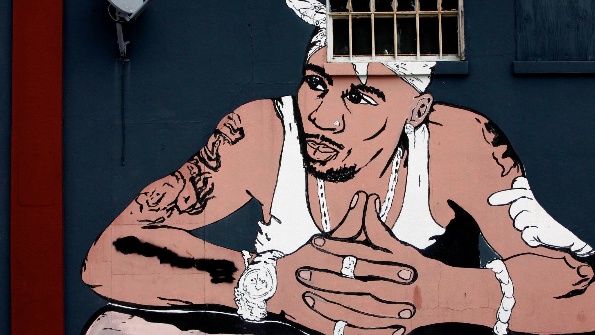 Tupac-Graffitti auf einem Tattoo-Shop in Tampa, Florida 