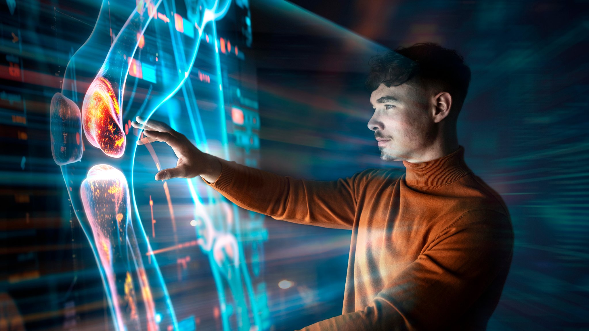 Ein Mann bedient einen großen Touch-Screen