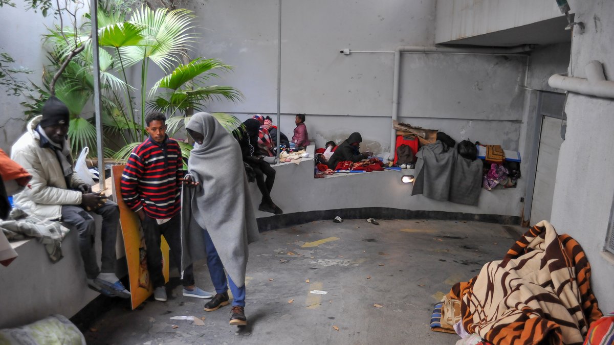 Afrikanische Migranten vor dem UNHCR Hauptquartier in Tunis, der Hauptstadt Tunesiens