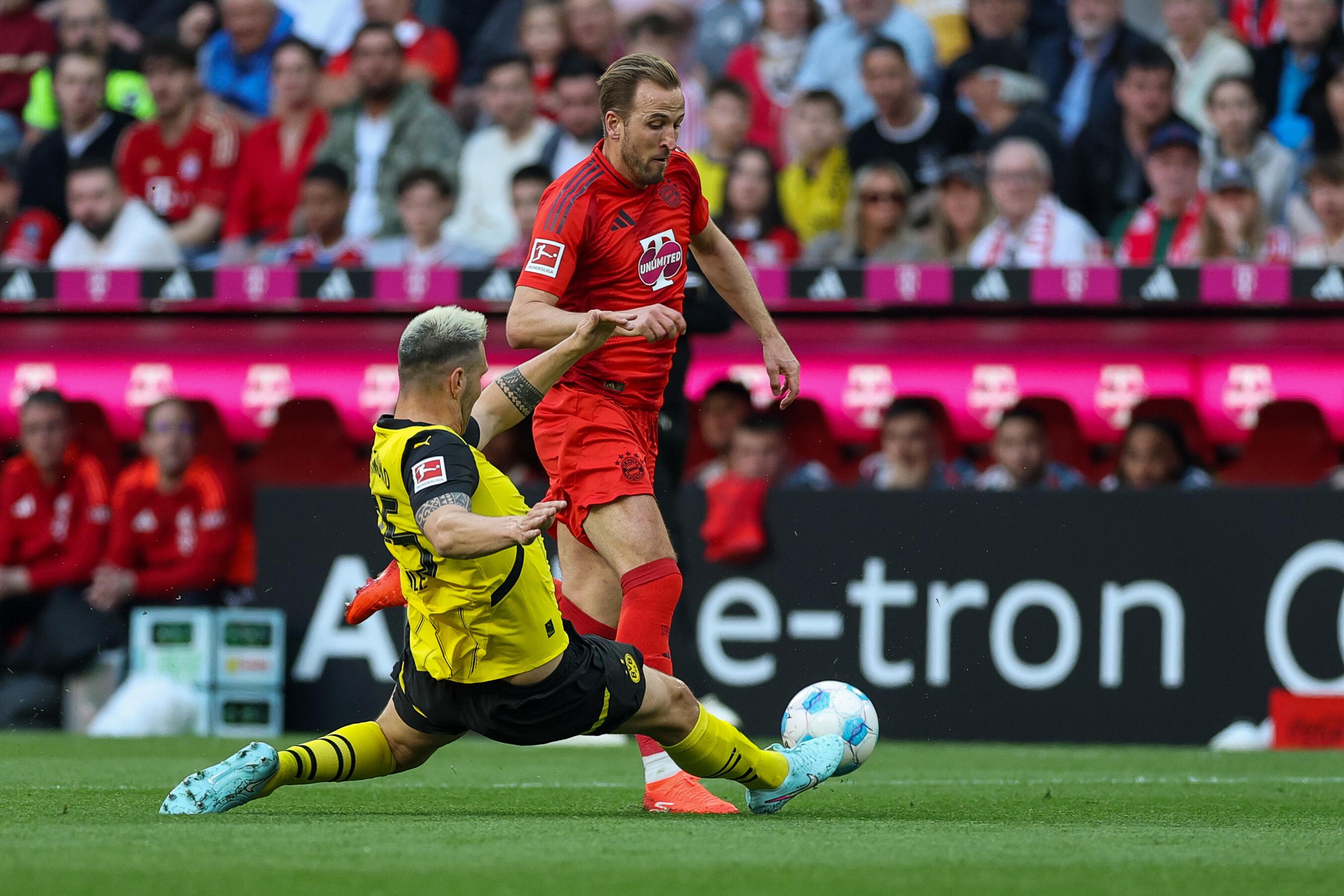 Treffen auch am Samstag wieder aufeinander: Harry Kane und Niklas Süle (grätschend). | Bild:picture-alliance / dpa
