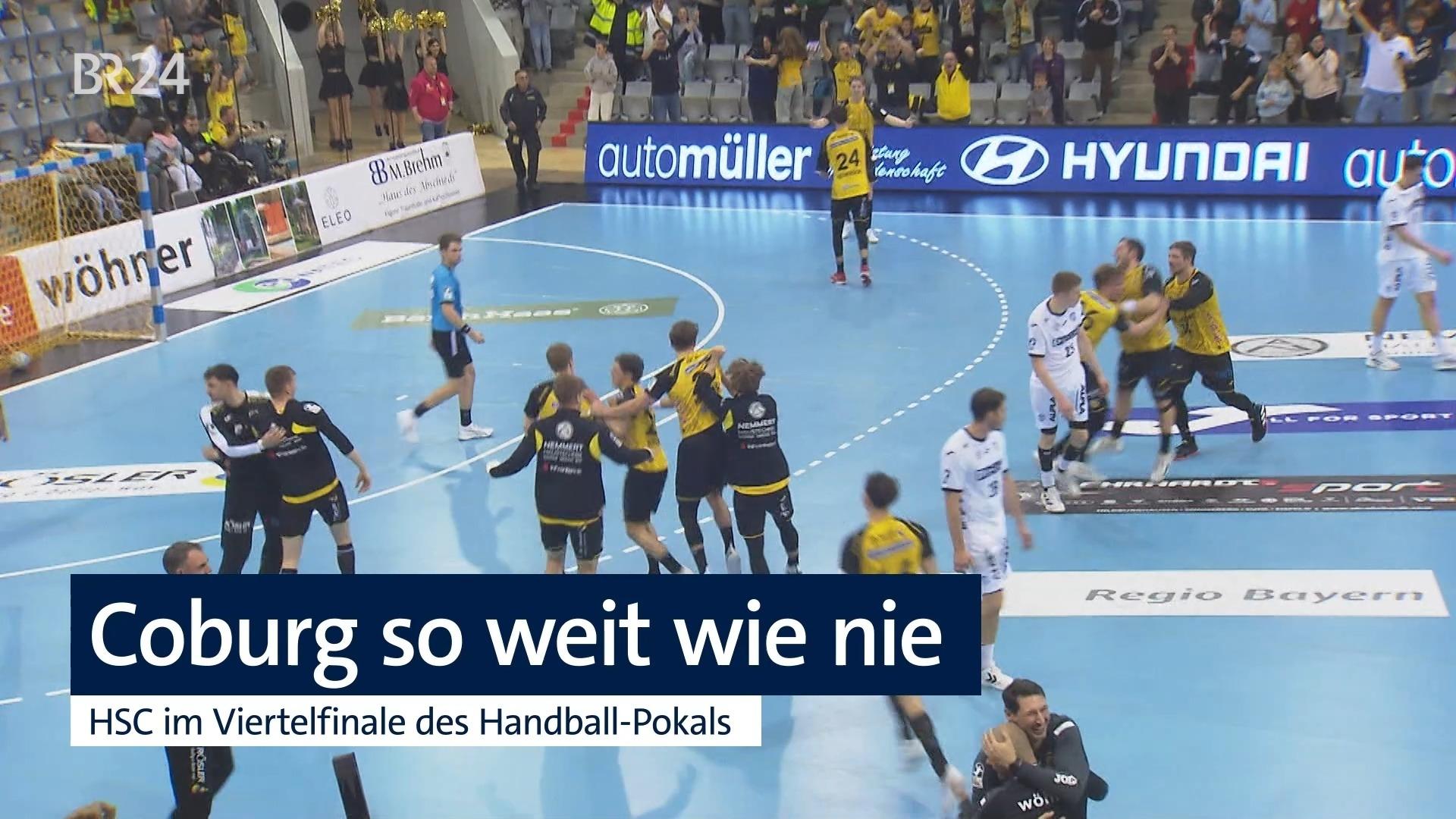 Zwei Handball-Mannschaften spielen, im Hintergrund Publikum auf den Zuschauerrängen. | Bild:BR 2024